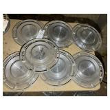 GROUP OF SEVEN 1960S CHEVROLET HUBCAPS