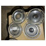 GROUP OF FOUR 1961 CHEVROLET HUBCAPS
