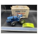 ERTL FORD 1710 4X4, NEW, BOX IS ROUGH, BLUE, COLLE