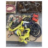 Assorted tools, flashlights, cables, straps