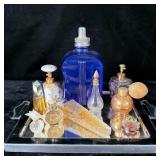 Mirrored tray of vintage perfume bottles &>