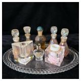 Glass tray of vintage perfume bottles full bottle>
