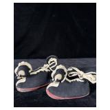 1950s Walt Disney skunk slippers