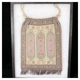 Large antique beaded purse in display case >