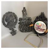 John Adams & Cherub Cast Iron Footed Trivets, >