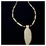 Native American leather and Bone beaded feather