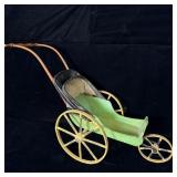 Victorian three-wheeled wooden doll carriage >