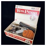 What cigar box filled with miscellaneous antique
