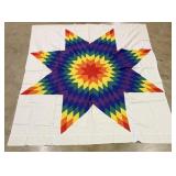 Hand stitched star quilt made 1973 during wounded