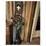 Bronze-finish Art Nouveau–style female statue with flowing form and sculptural detailing.