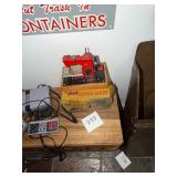 Vintage battery operated toy sewing machine
