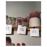 2 vintage cranberry, gold trimmed shot glasses