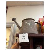 Antique metal water can