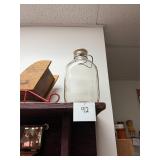 Antique one gallon glass milk bottle with lid