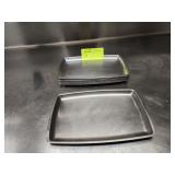 TWELVE STAINLESS STEEL TRAYS