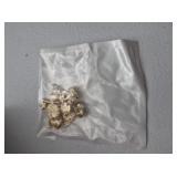 $20 unknown gold color braclet with charms. Will u