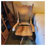 Lovely Rolling Oak Office Chair Leans Back Too