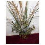 Brass planter and floral arrangement