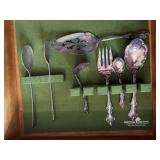 Silver utensils (8)
