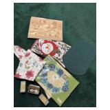 Table cloths placemats and brass napkins rings
