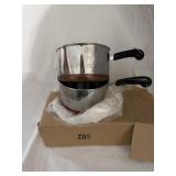2 Revereware copper bottom measuring cups