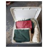 Tote of sheets table cloths and blanket