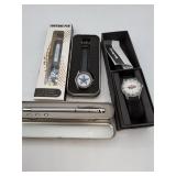 Two Watches, Pen, and Laser