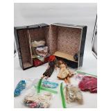 Barbie case with dolls and clothing