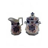 Hand-painted porcelain creamer and sugar bowl
