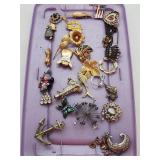 Metal and rhinestone brooch pins