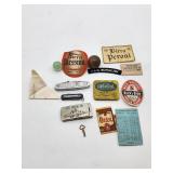 USS Bordelon items with belt buckle, knives, ephe