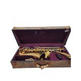 Saxophone with mouthpiece and hard case