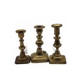 Three brass candlesticks
