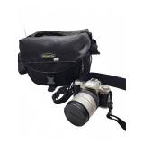Pentax ZX-50 camera with Sigma lens, bag, film can