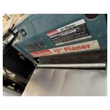 Makita model 2012 12' Planer.