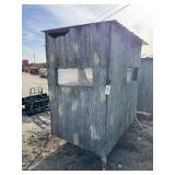 Elevated hunting blind. 48'W, 72'L, 72'T, plywood