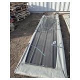 100-sheets of 12' corrugated sheet metal. Cover