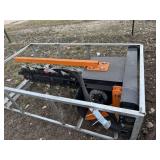 Wolverine TCR-12-48H skid steer trencher. (new)