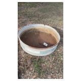 Small sheep and goat trough. Holds water.