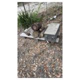 Heavy steel box with drill bits and some oak