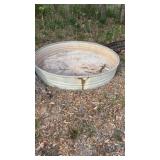 Galvanized sheep and goat trough.