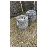 1 roll of slick wire and 1 roll of barbed wire. 2