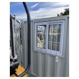10' shipping container with side door and window.