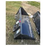 Wolverine TDB-11-66W smooth skid steer bucket.