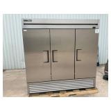 New True commercial 3 door refrigerator on casters
