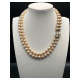 Vintage double strand single knotted necklace.