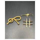 Gold tone three brooches pin.