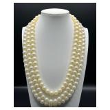 Vintage triple strand faux pearl necklace.
