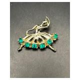 Vintage ballerina dancer with green rhinestones.