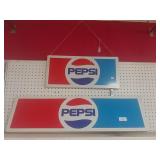 Two Pepsi Signs